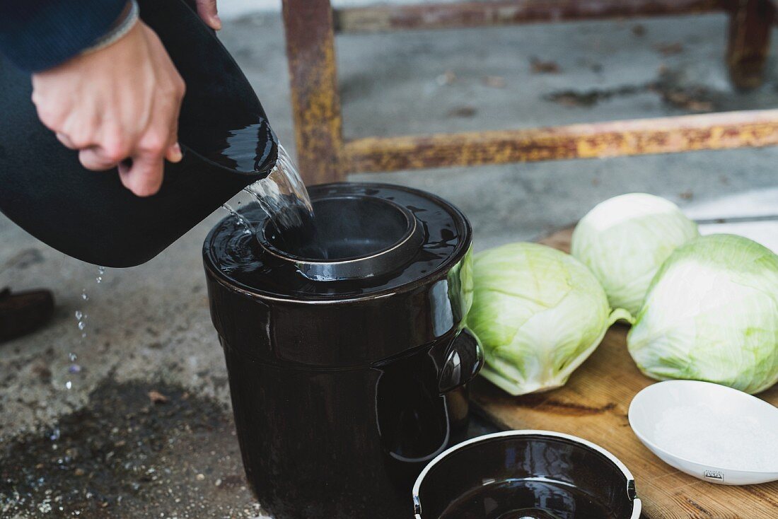 Hot water being poured into a pot