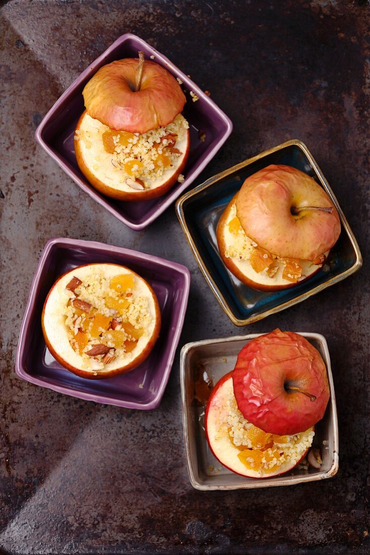 Baked apples with millet, dried apricots, almonds and honey
