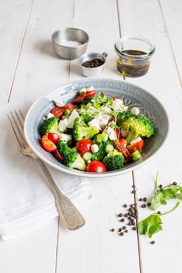 Broccoli salad with cherry tomatoes and mozzarella