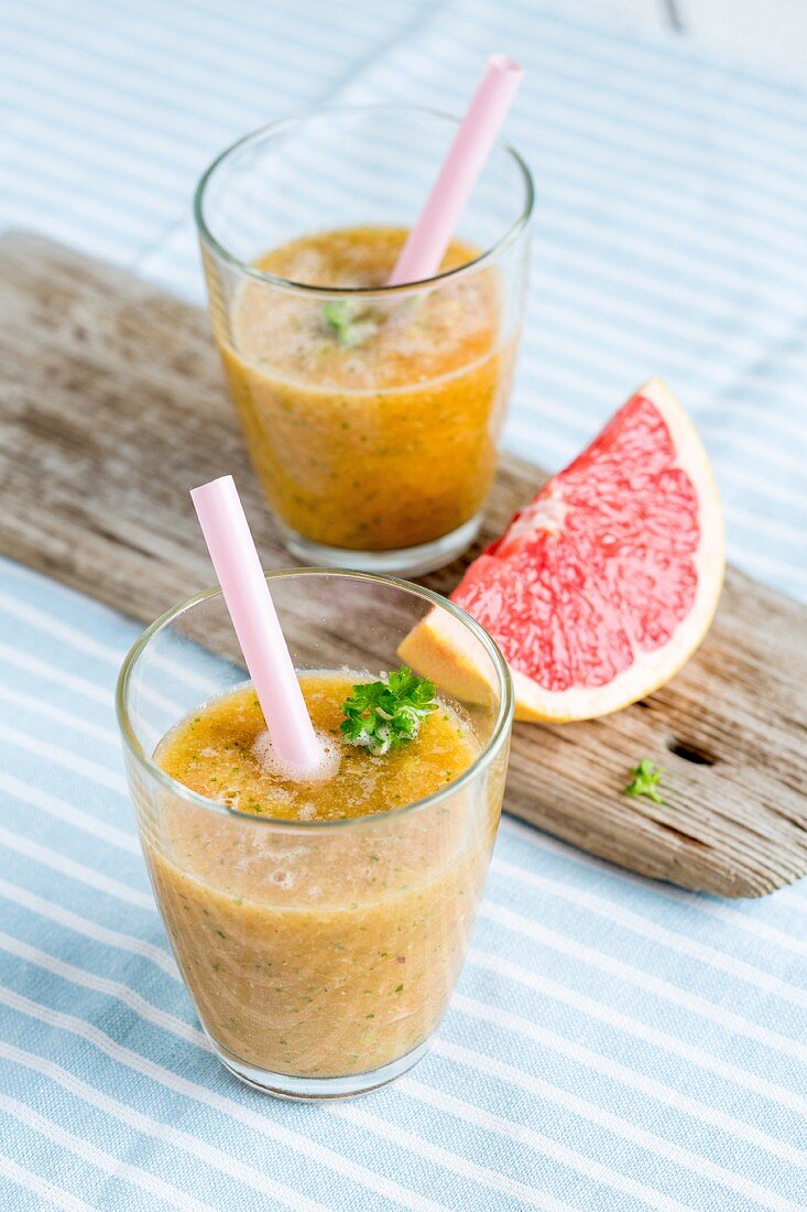 Orange and grapefruit smoothie with parsley