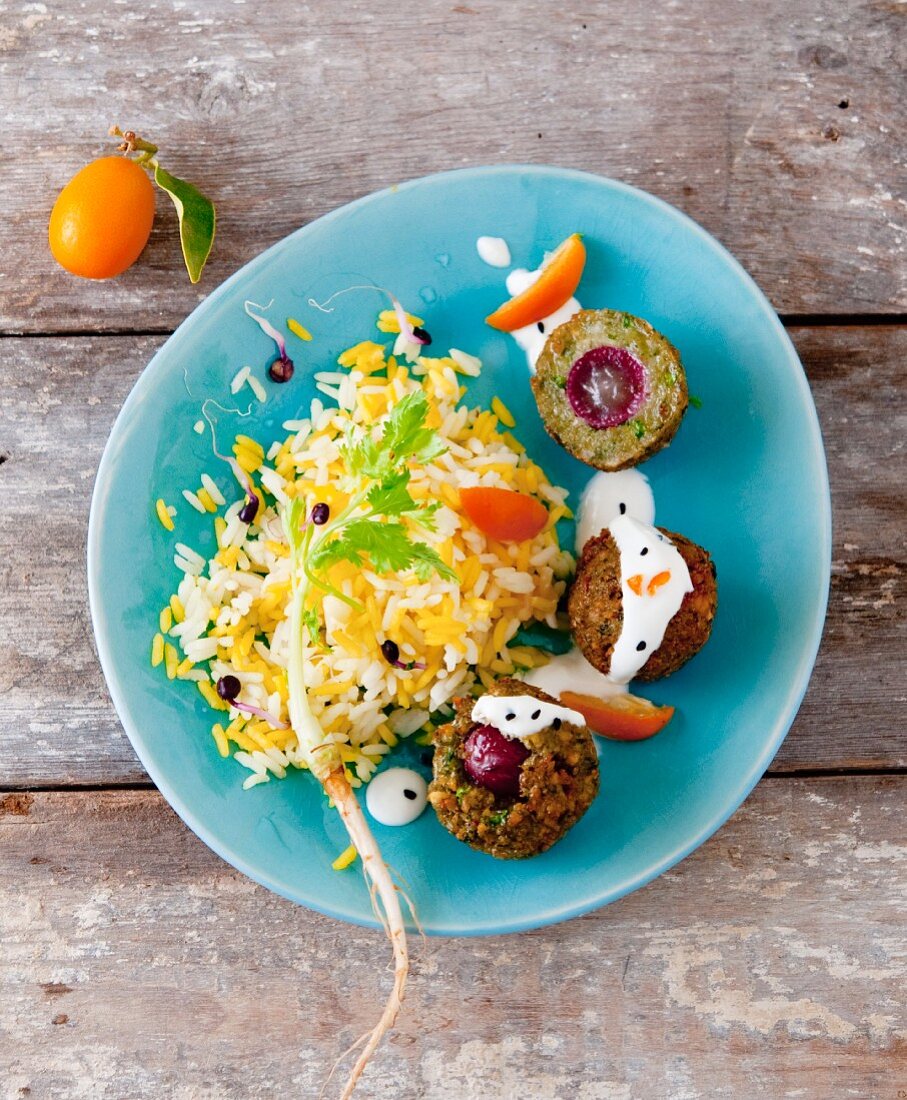 Falafel filled with grapes served with rice