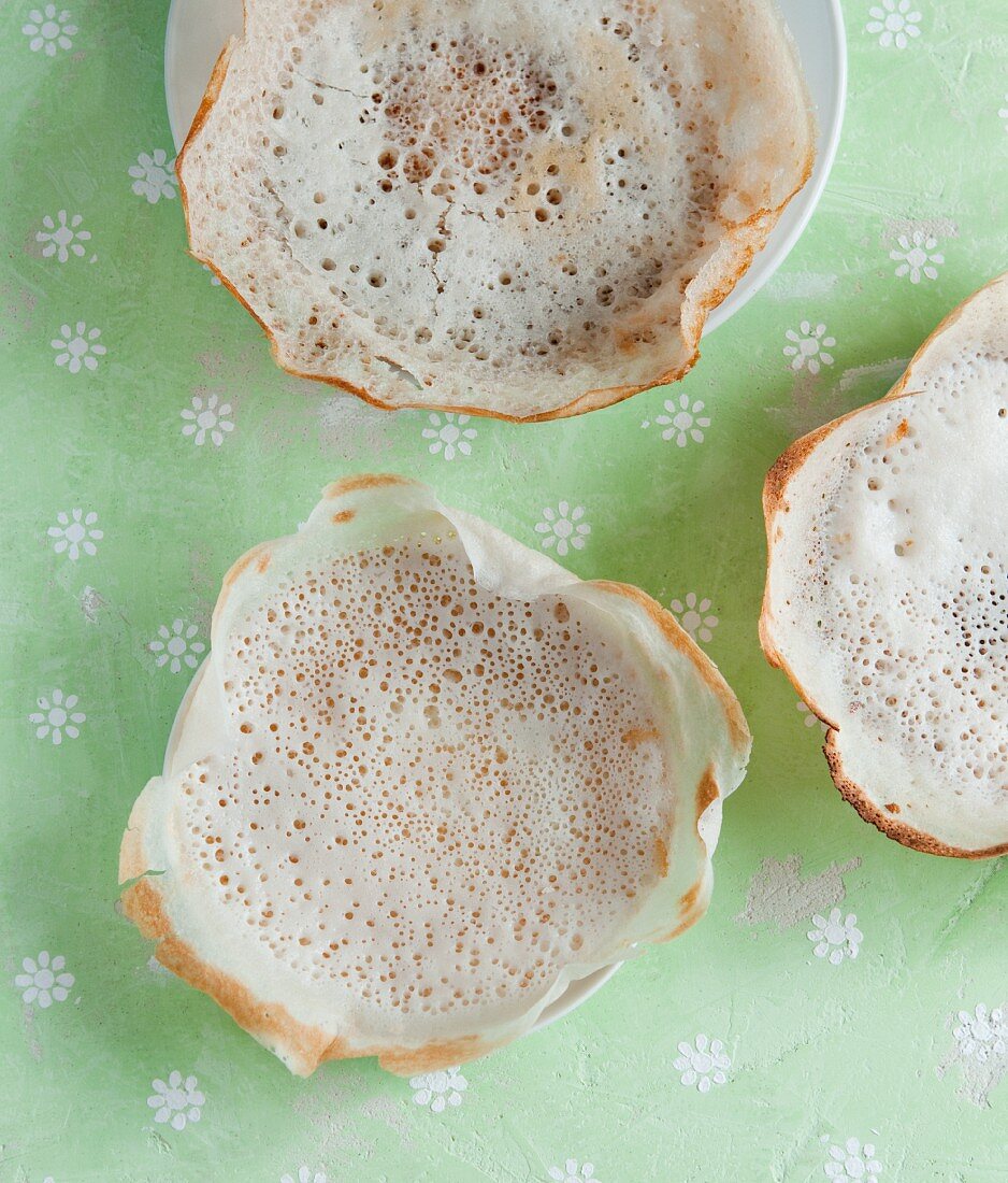 Hoppers or Appam (coconut and rice pancakes, India)