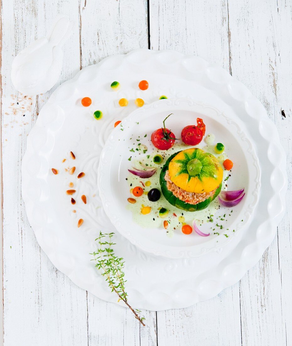 Stuffed rondini with parsley sauce and a side of vegetables