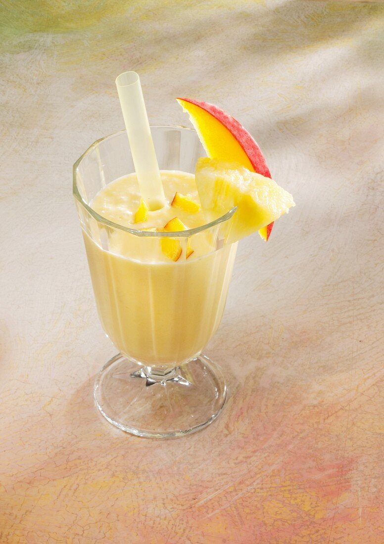 A pineapple and ginger smoothie with mango and almond milk