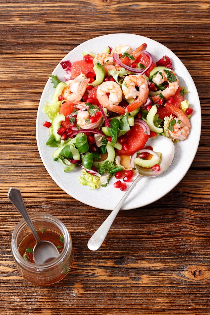 Prawn salad with grapefruit, cucumber and pomegranate seeds