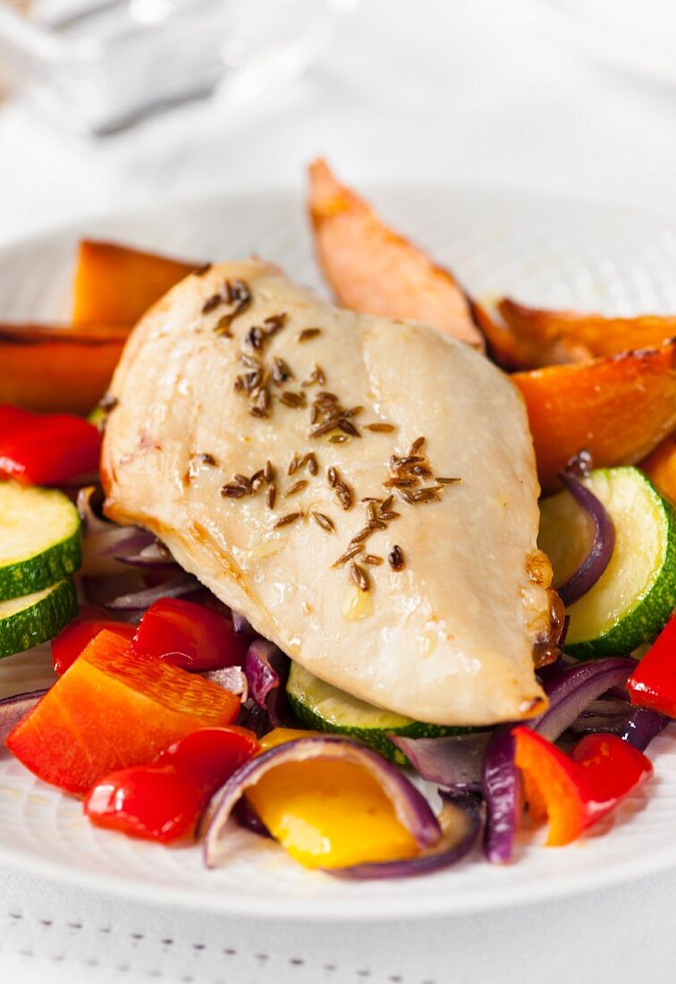 Chicken breast with sweet potatoes and oven-roasted vegetables