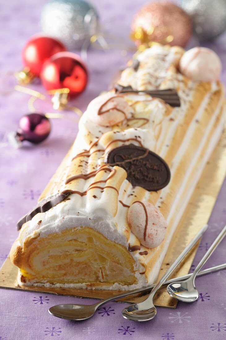 A yule log with Christmas decorations