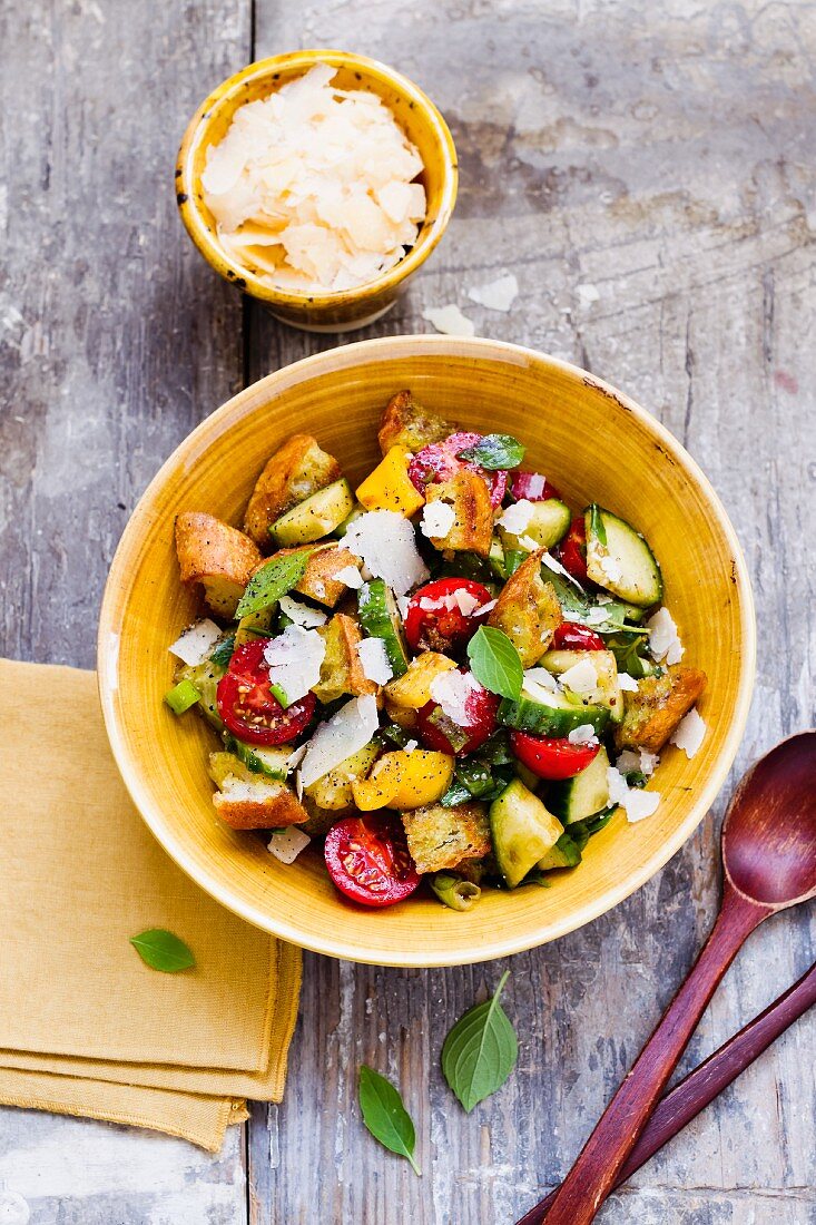 Bread salad with cherry tomatoes and Parmesan cheese
