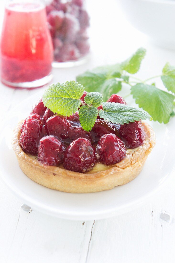 Raspberry tartlet with lemon balm