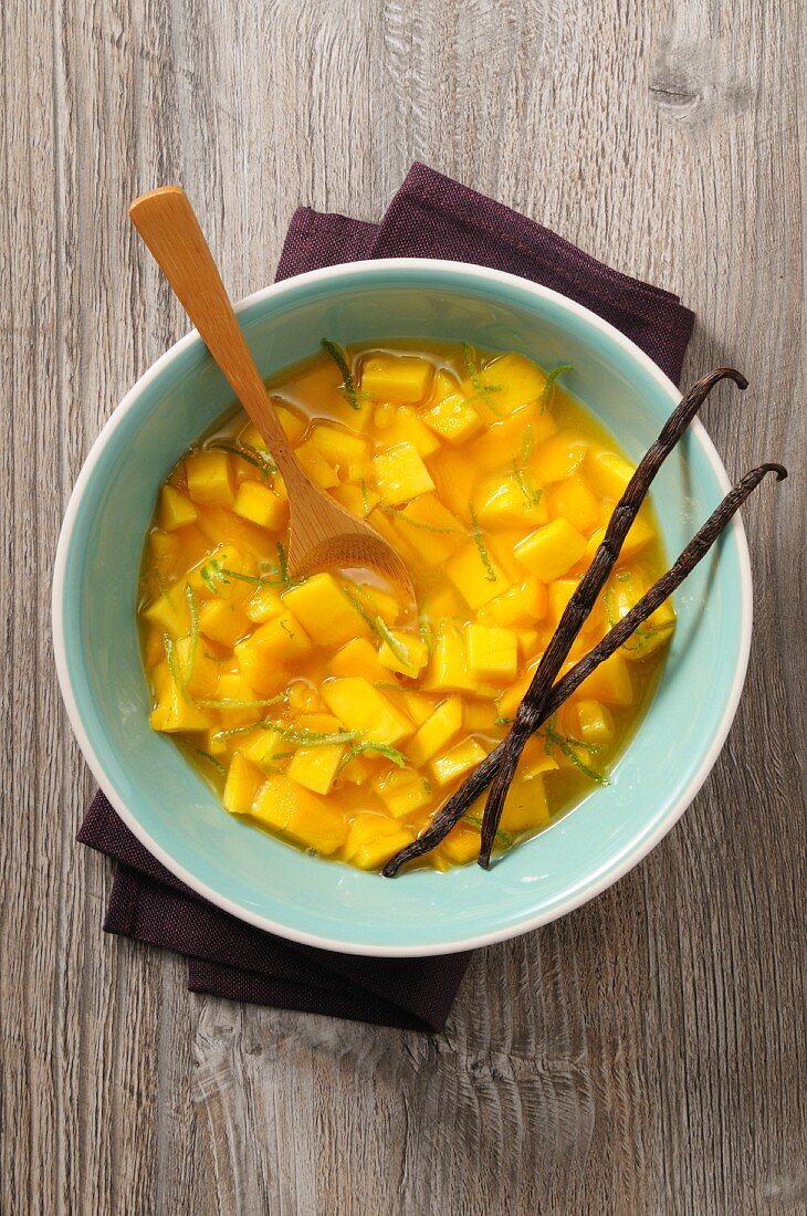 Iced mango soup with lime zest and vanilla pods