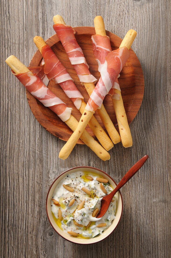 Grissini with Parma ham and a pine nut dip