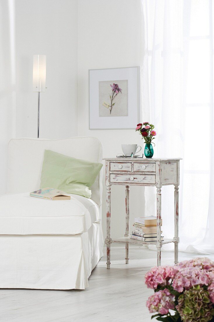 Small antique table restored in shabby chic style