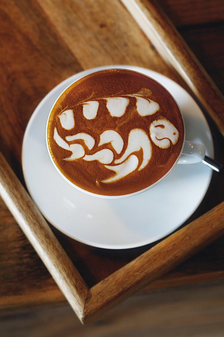 A milk pattern on a cup of coffee