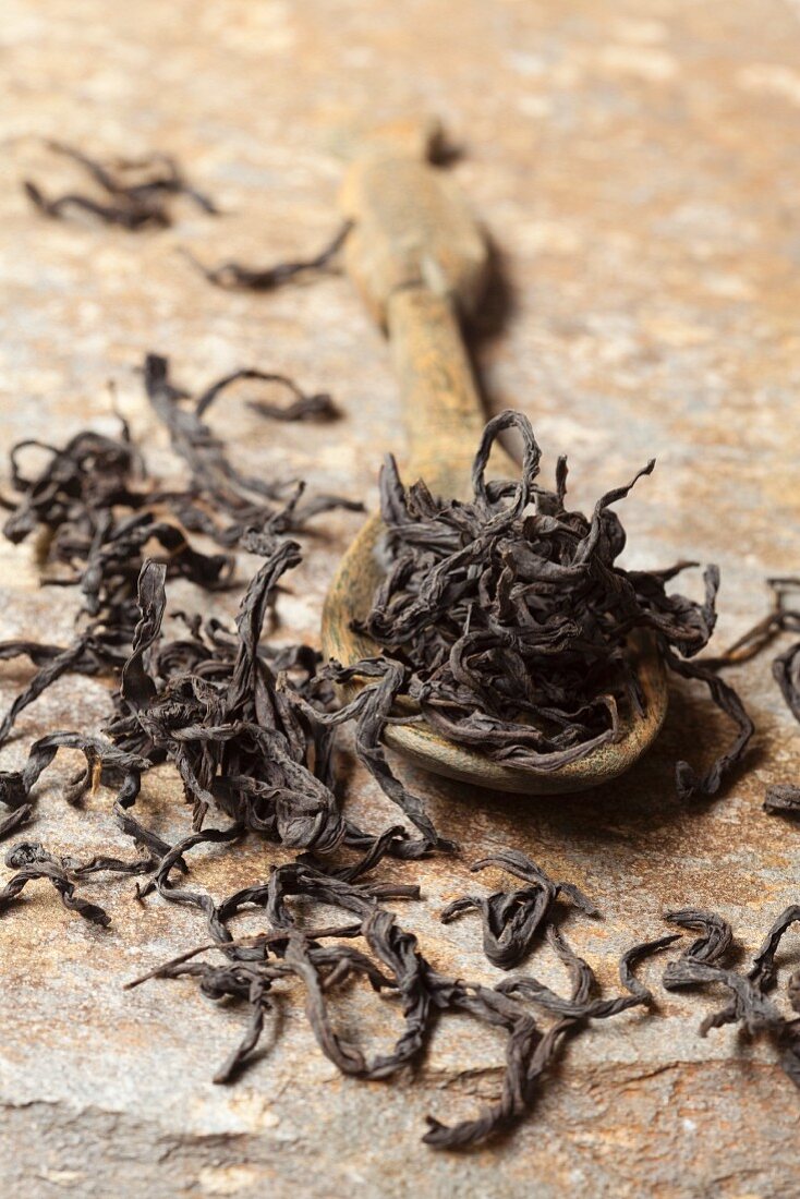Sri Lanka black tea on a wooden spoon