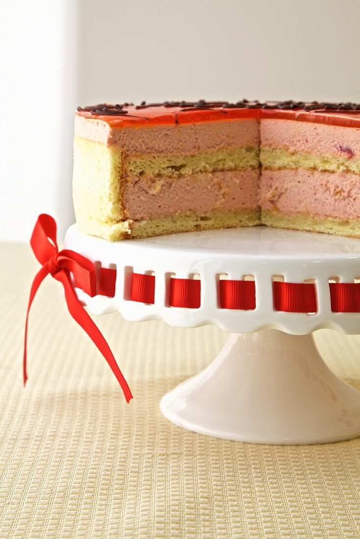 Passionata sponge finger cake with passion fruit, raspberry mousse and cherry syrup (France)