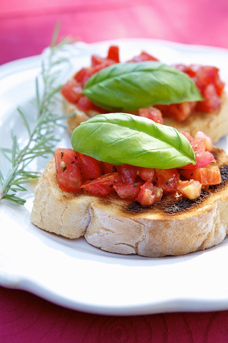 Bruschette (grilled bread topped with tomato and basil, Italy)