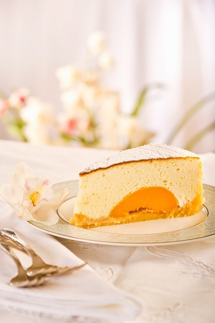A slice of quark cake with apricots