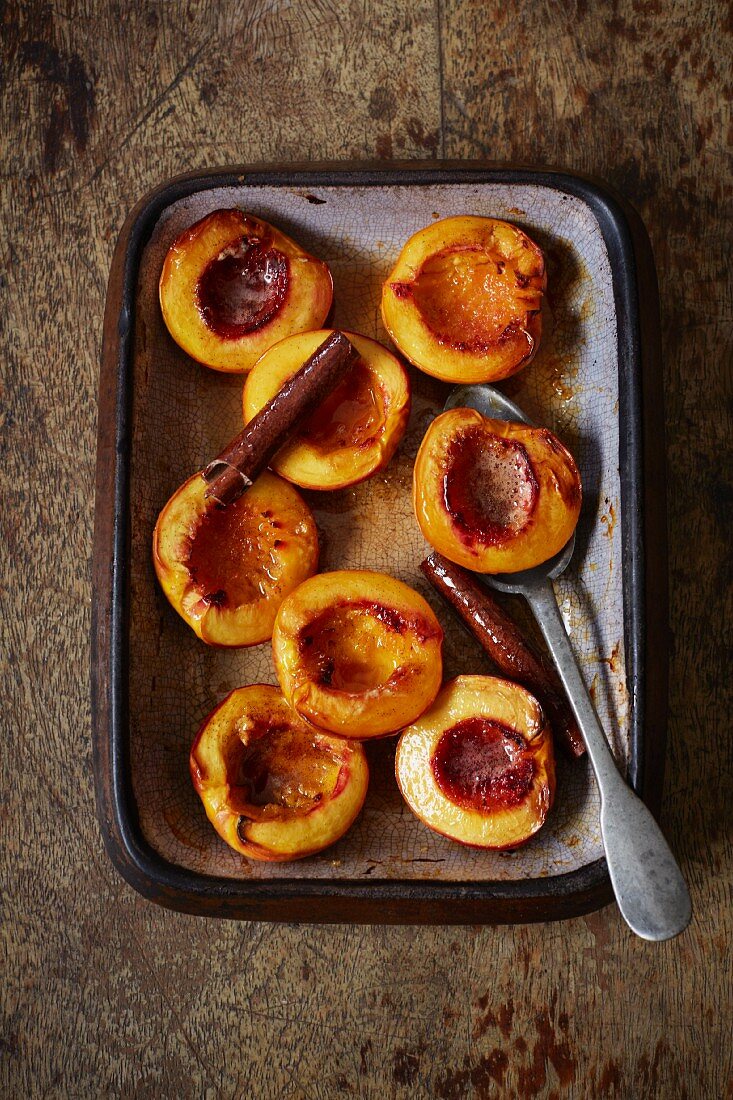Oven-roasted peaches with cinnamon