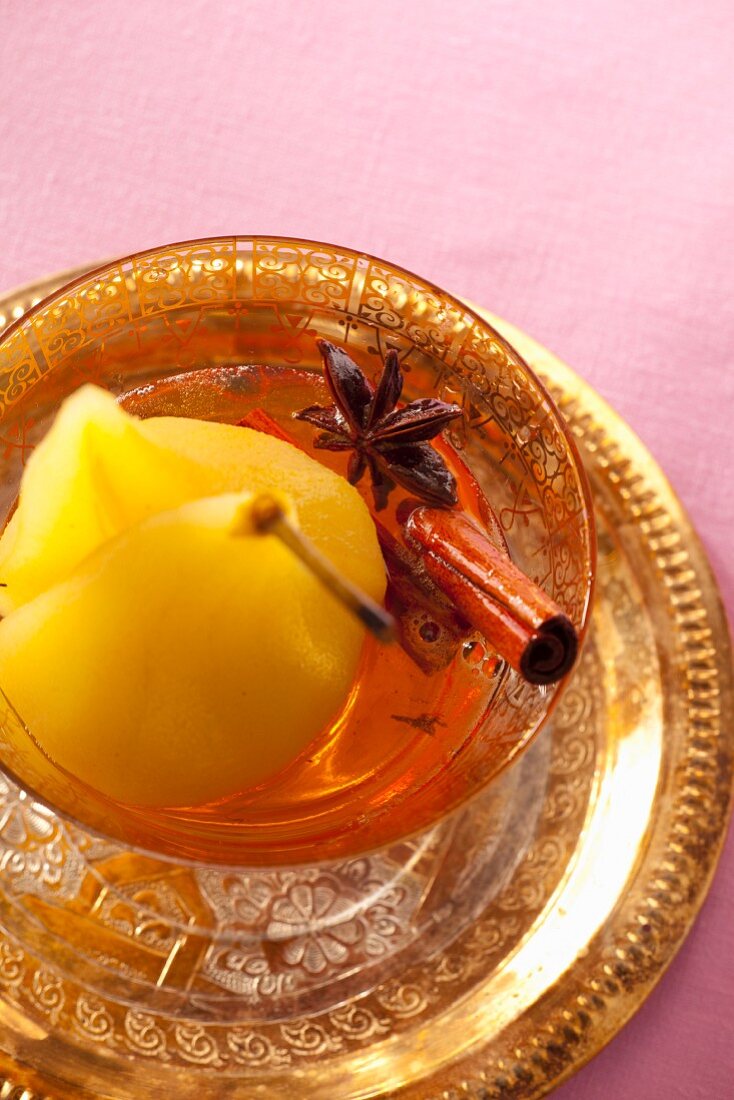 Poached pears in a spicy syrup