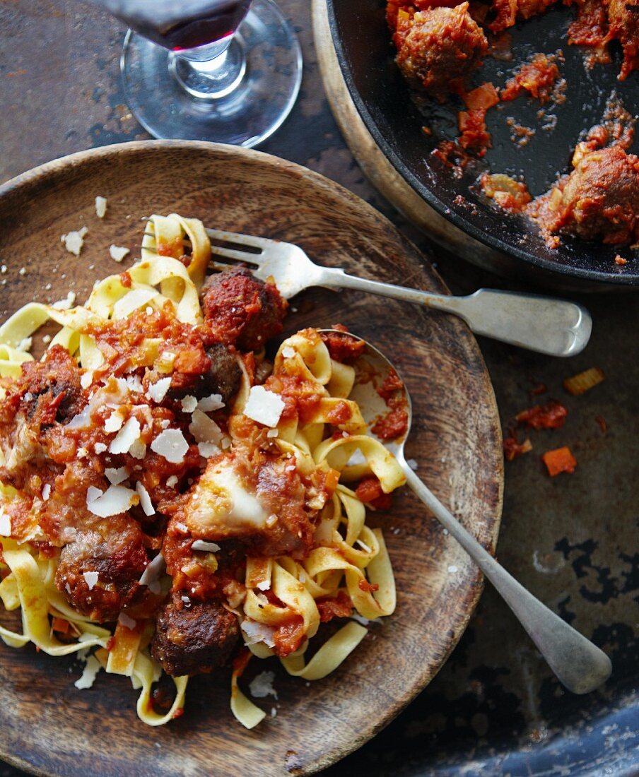 Ribbon pasta with meatballs and tomato sauce