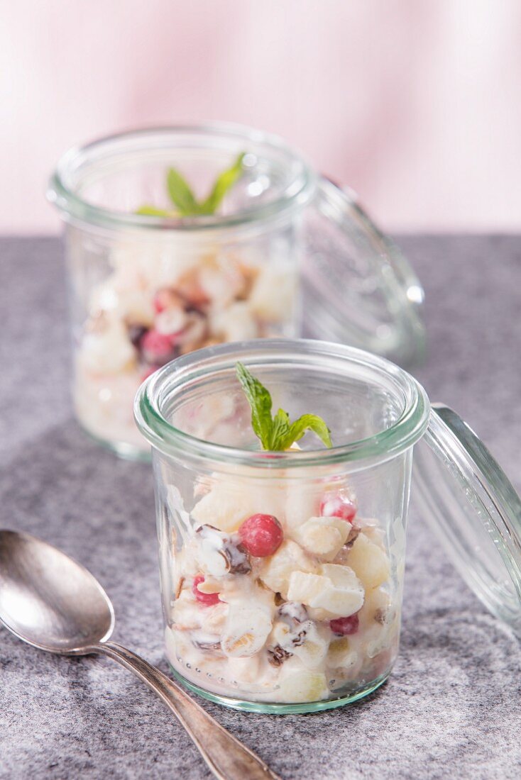 Bircher muesli with redcurrants in jars