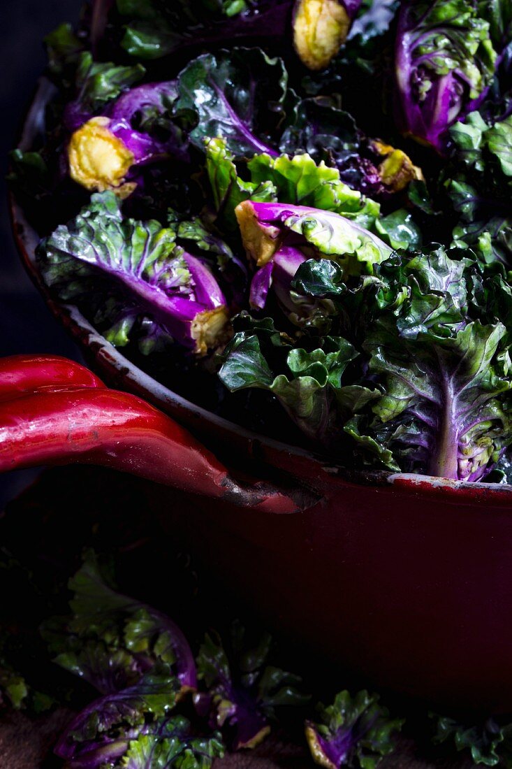 Cabbage florets in an antique metal colander (close up)