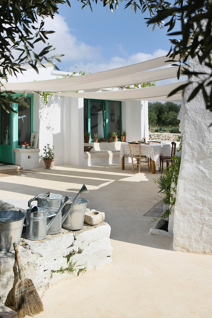 Awning in courtyard of Mediterranean bungalow