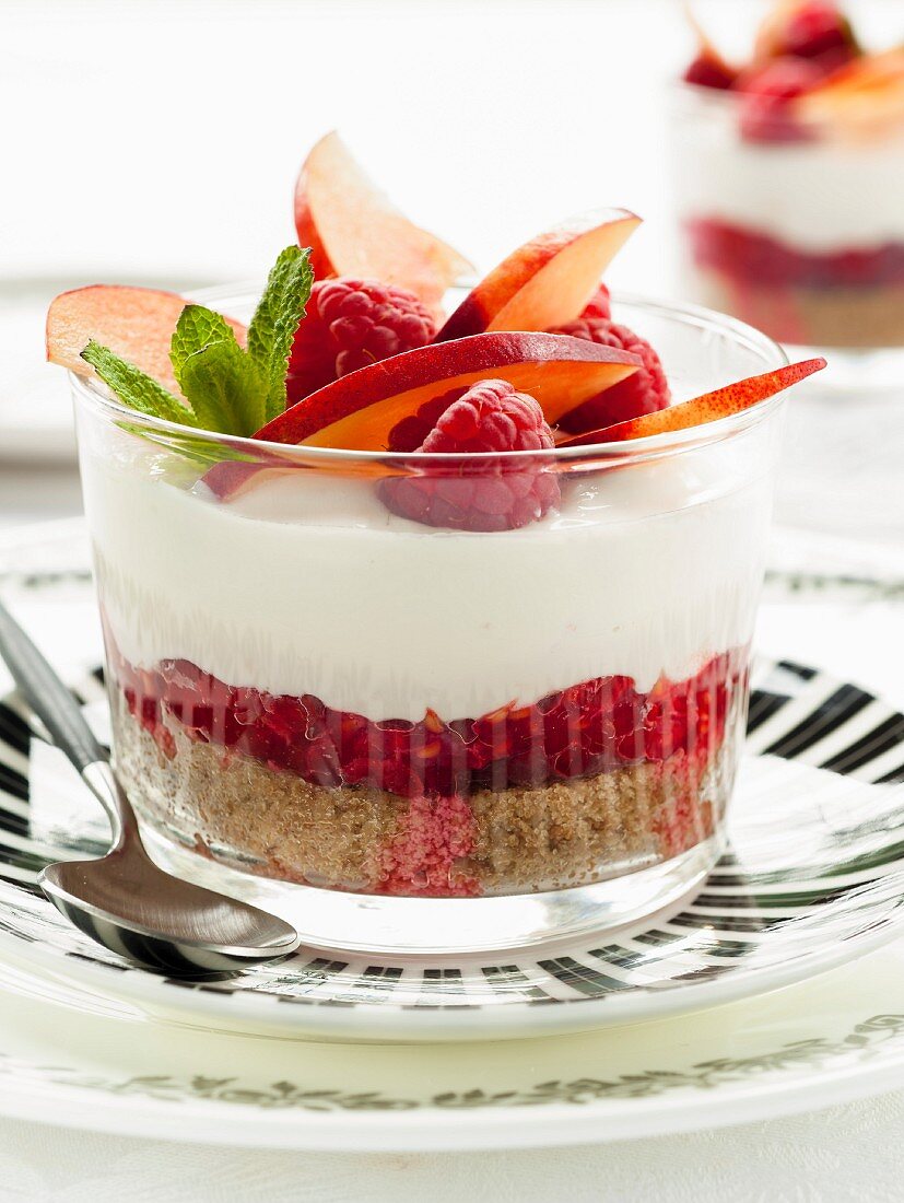 Raspberry and nectarine cheesecake in a glass