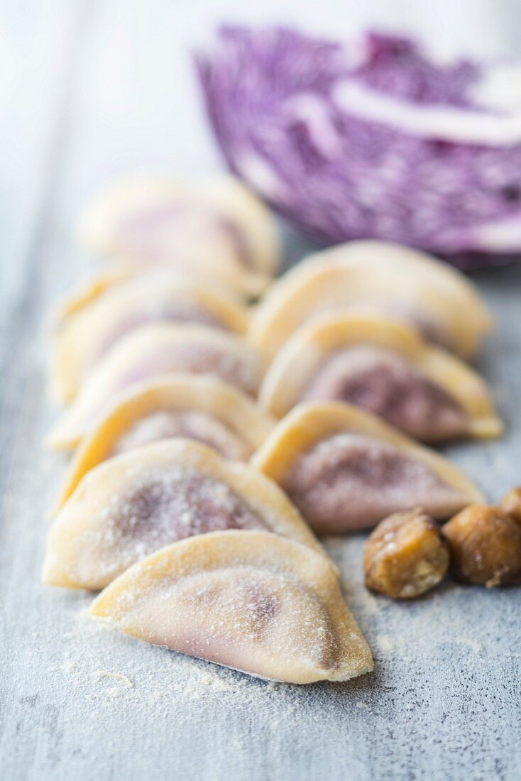 Homemade ravioli with red cabbage and chestnuts