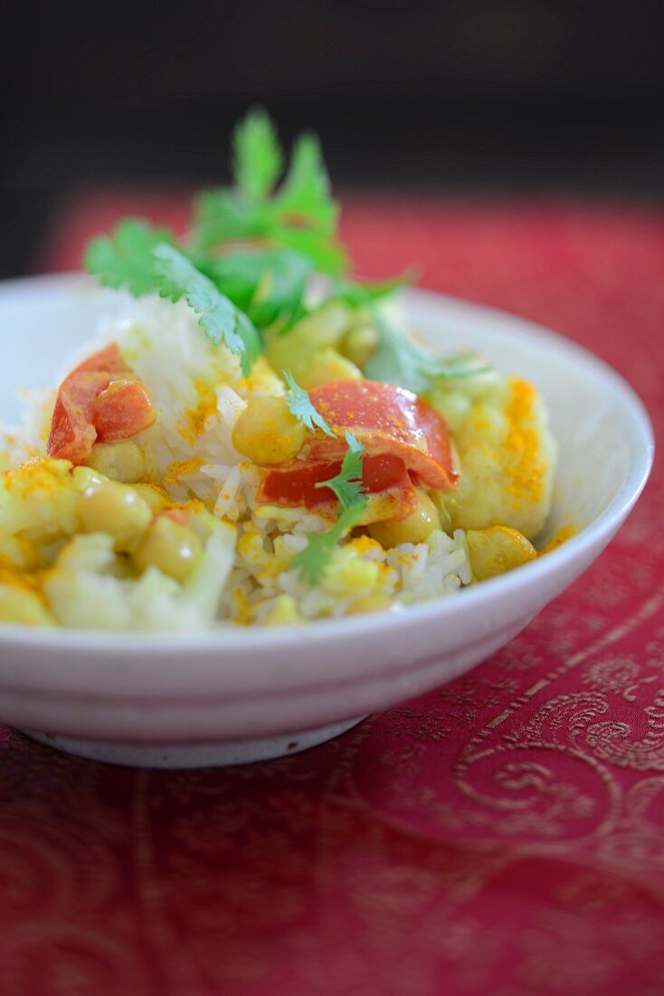 Cauliflower curry with chickpeas on a bed of rice