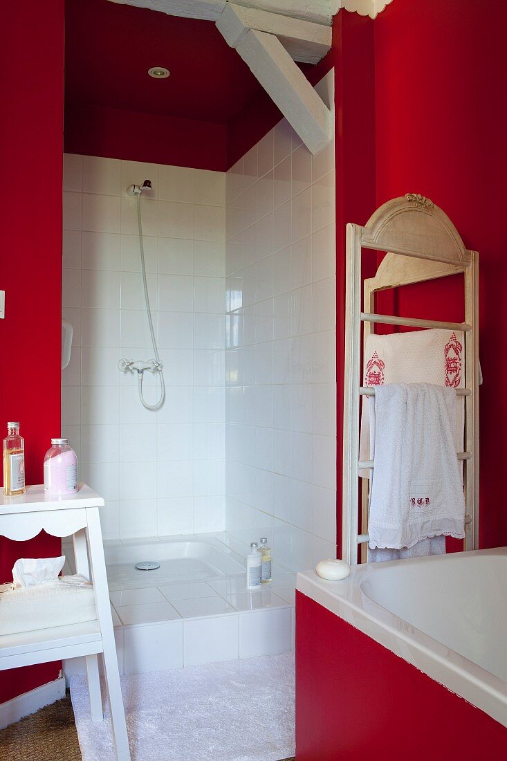 Vintage-style bathroom with red walls