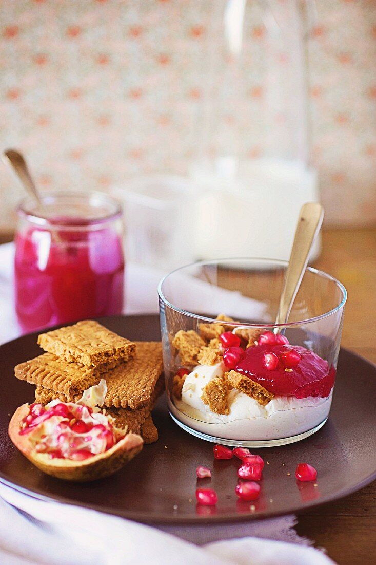 Yoghurt with cookies and pomegranate seeds