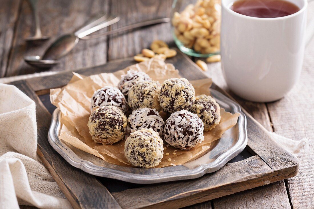 Healthy truffle parlines with peanuts on a plate