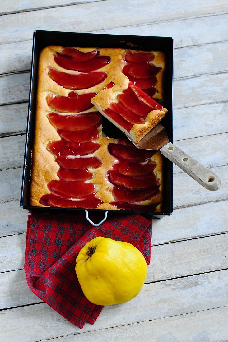 Quince cake in a baking tin