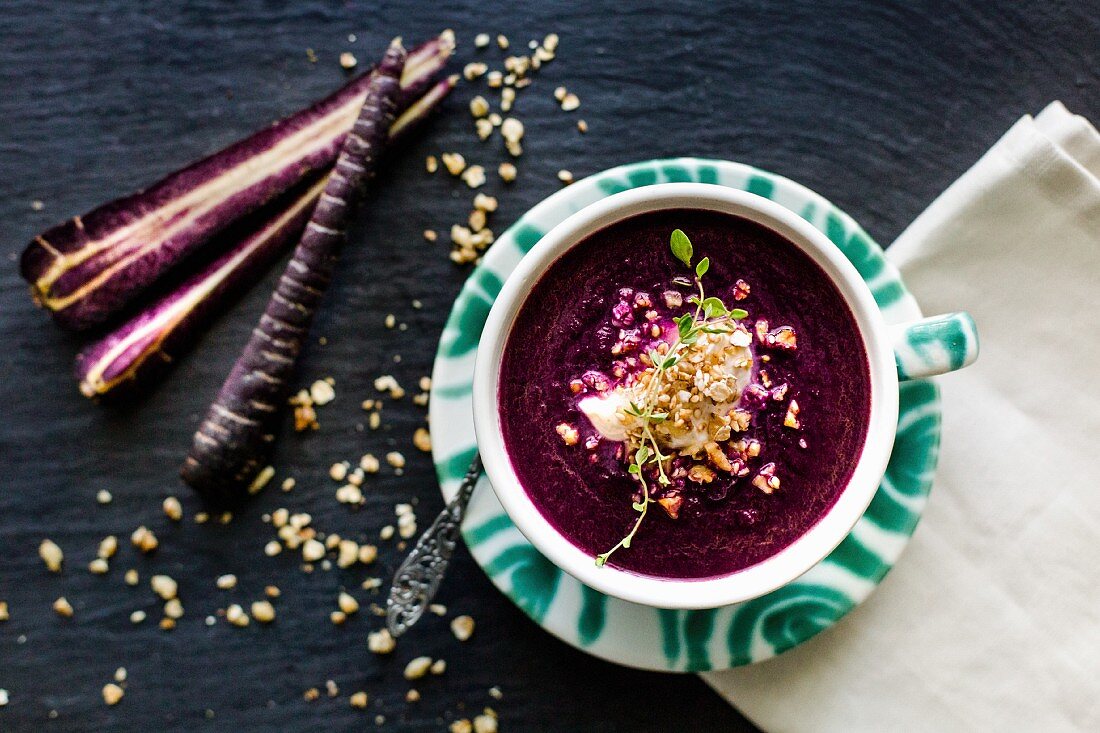 Cream of purple carrot soup with walnuts
