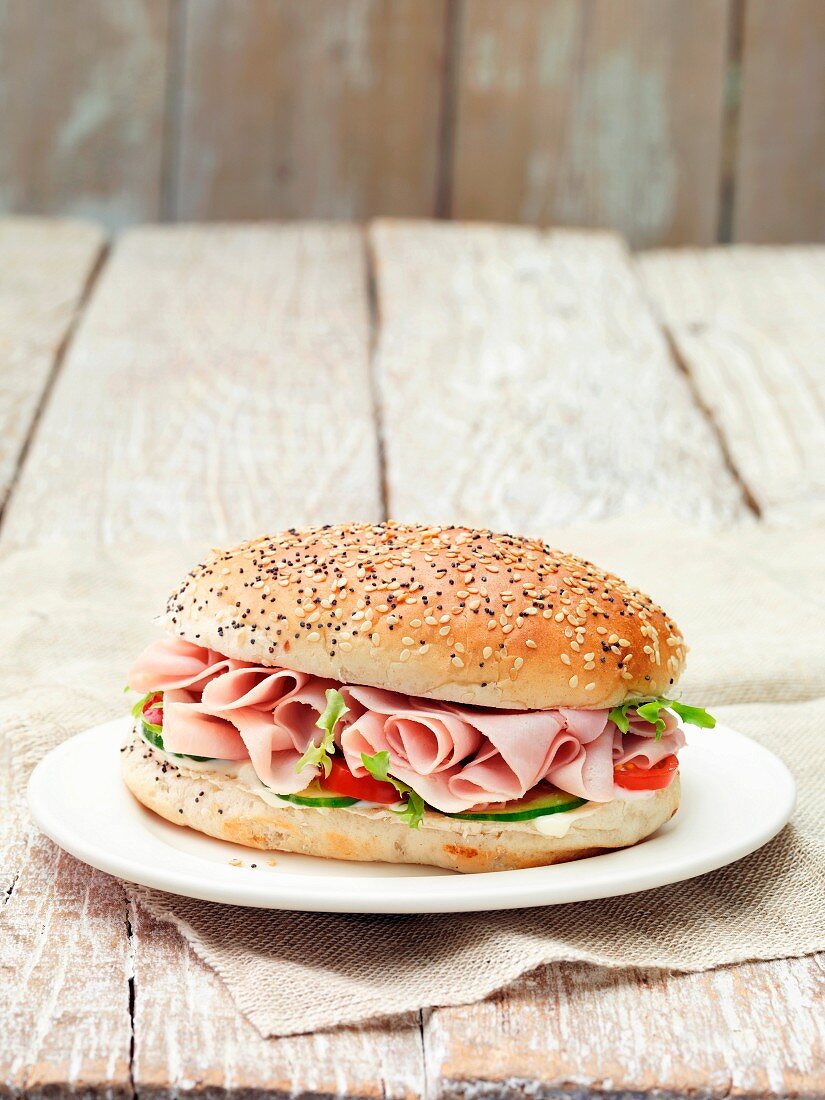 A ham sandwich on a plate