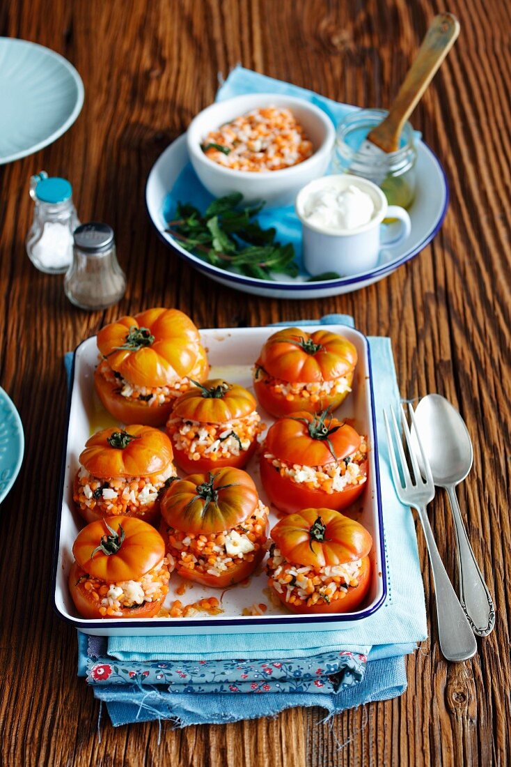 Stuffed tomatoes with rice, lentils, feta cheese and mint