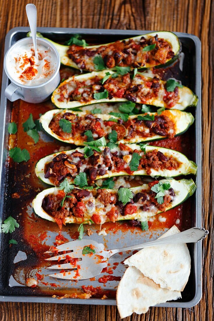 Courgettes filled with chilli con carne