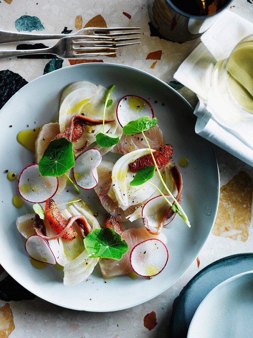 Raw Kingfish fillet with grilled grapefruit, fennel and radish