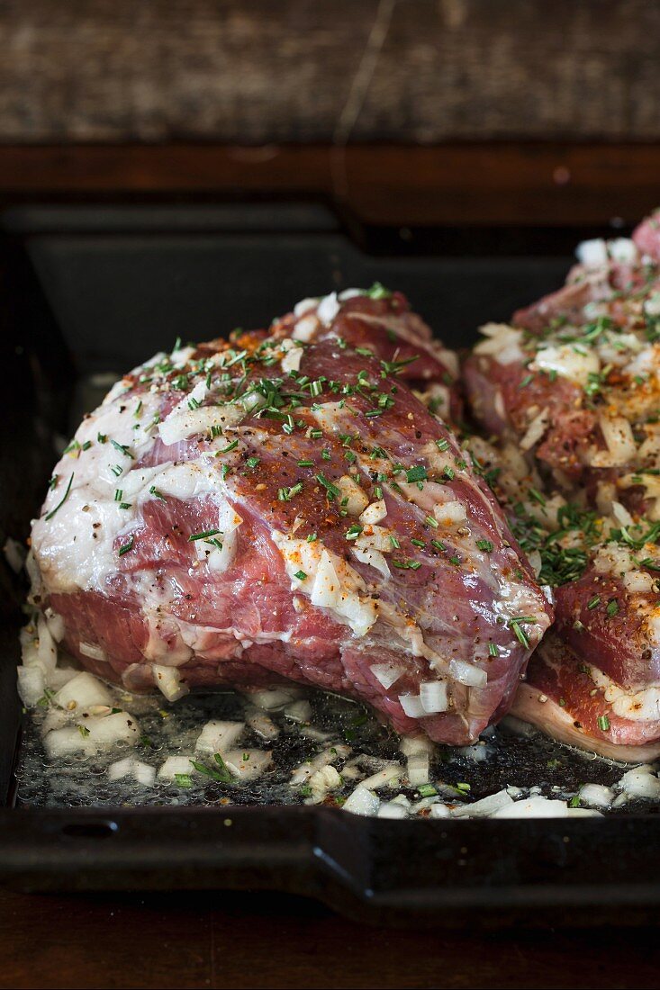 A fresh leg of lamb with a rosemary marinade