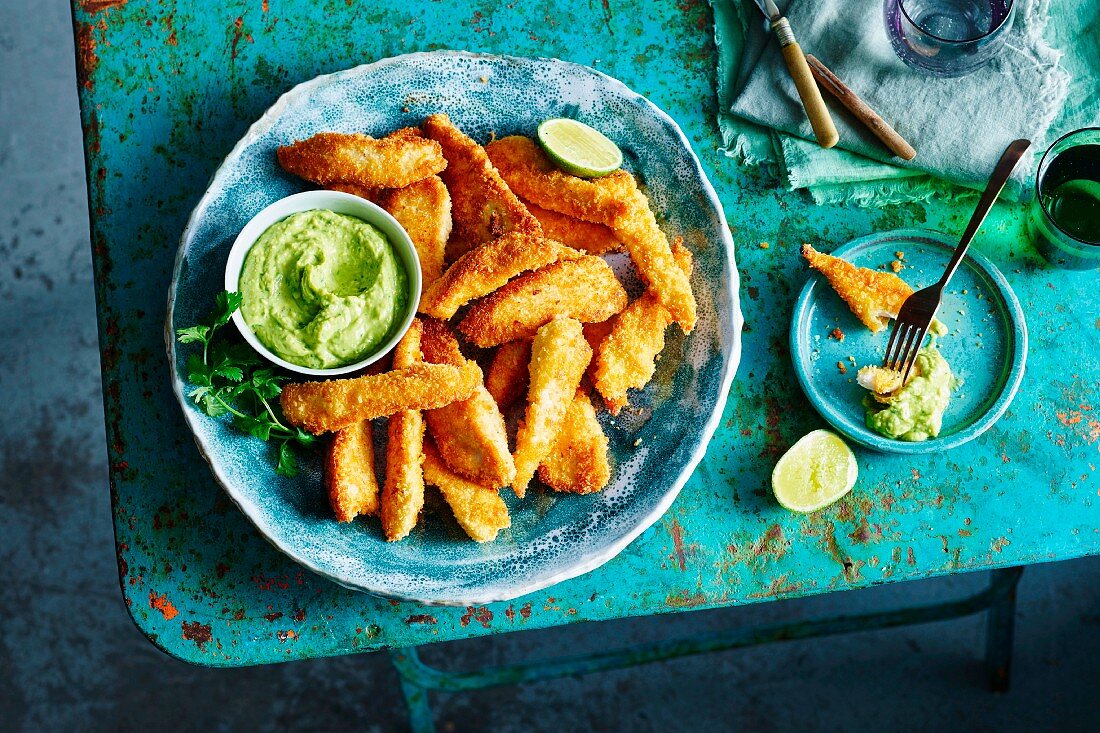 Chicken goujons in a coconut coating with an avocado dip
