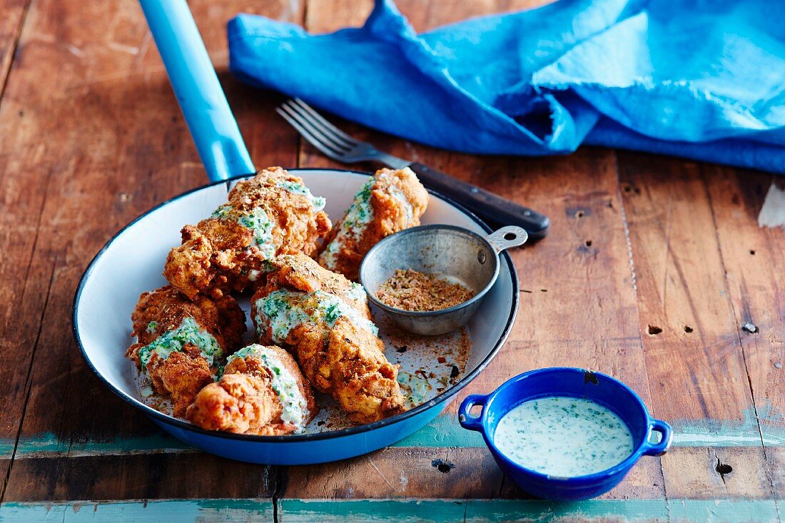 Cajun fried chicken with a green chilli dressing