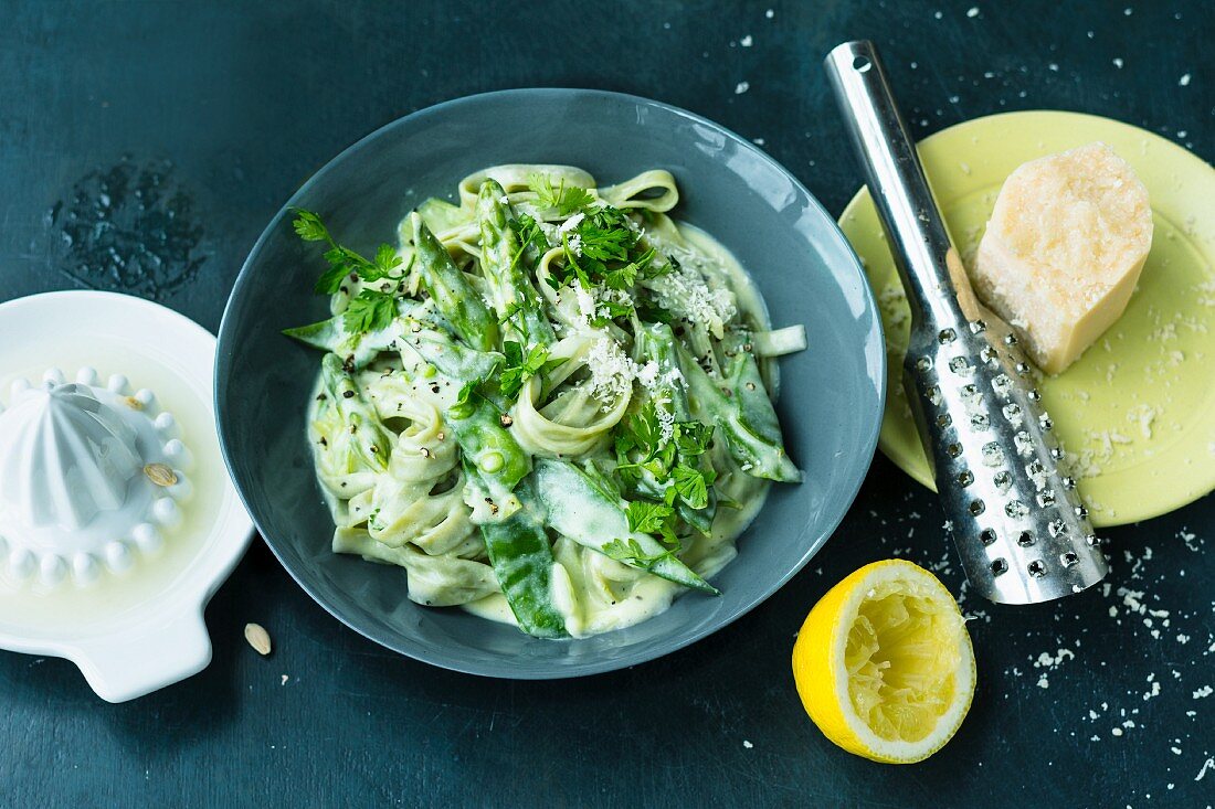 Green vegetable pasta with lemon sauce and Parmesan cheese