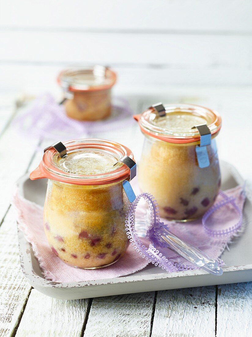 White chocolate cakes in jars as gifts