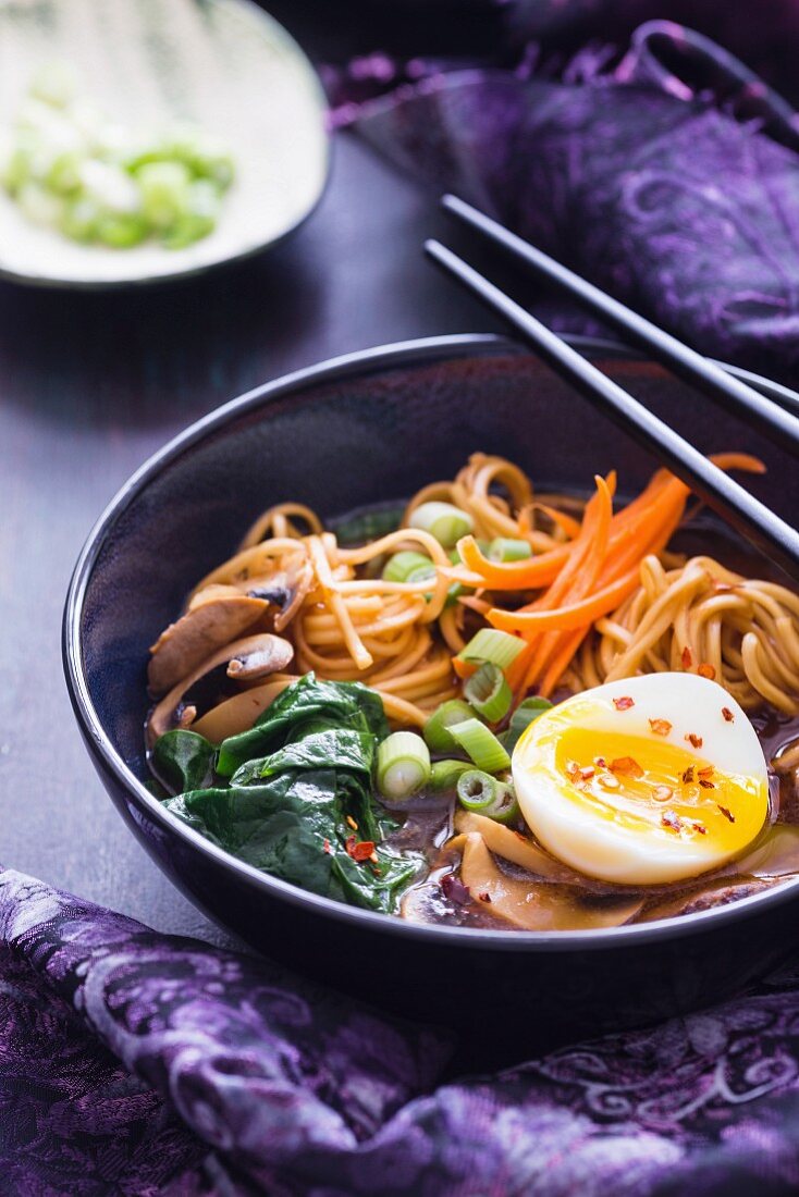 Ramen noodle soup with beef, vegetables and boiled egg (Asia)