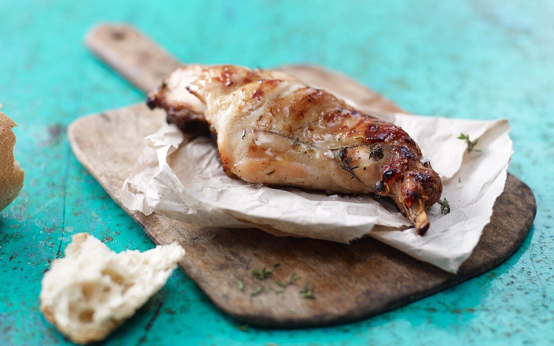Grilled rabbit leg with thyme