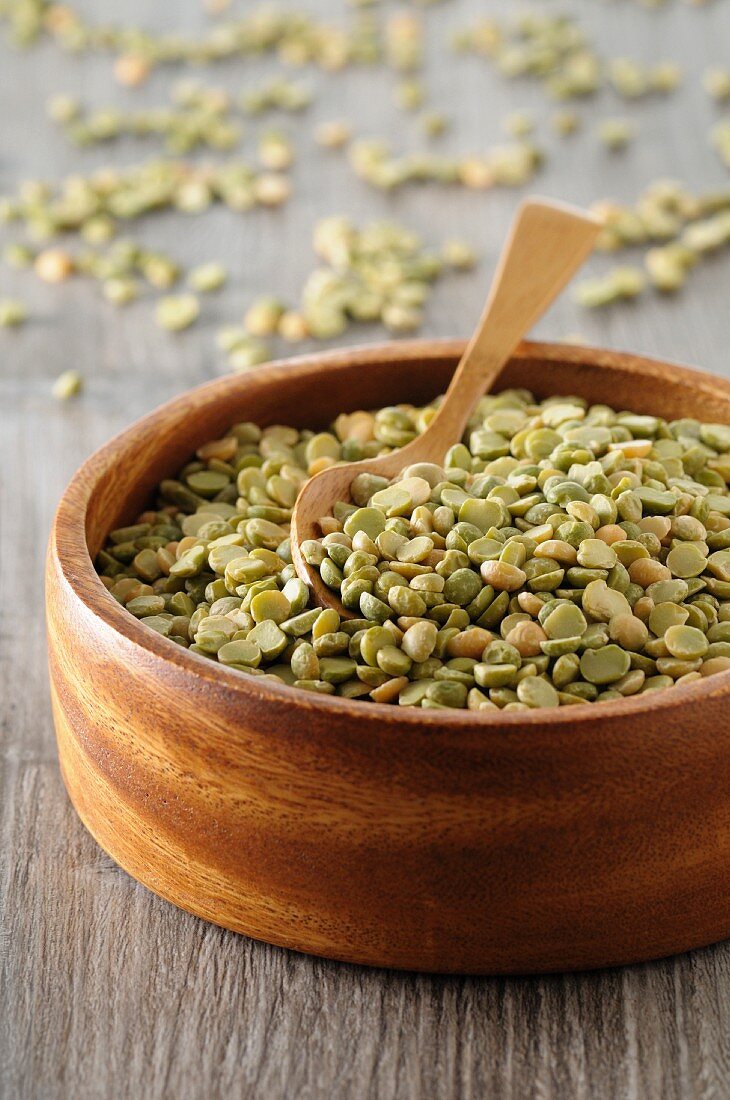 Dried peas in a wooden bowl