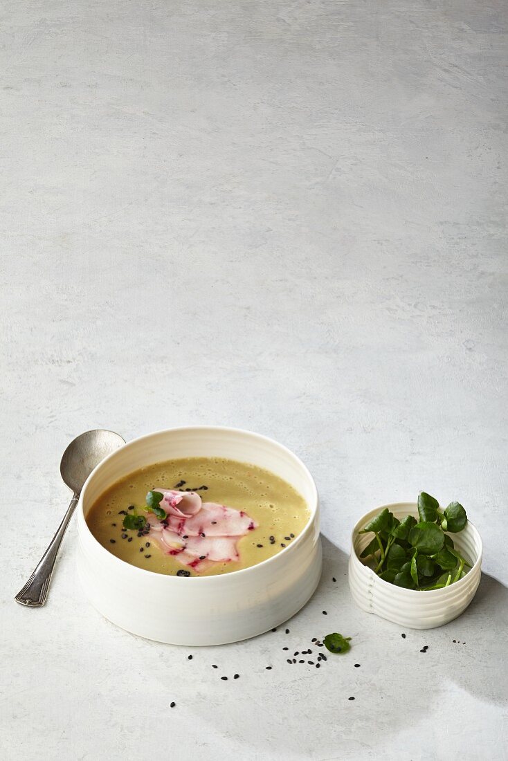 Cream of cubio soup with coloured cress and sumach