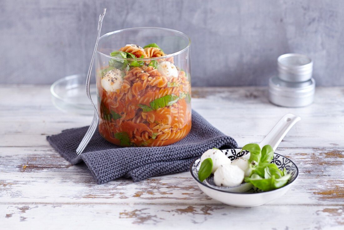 Wholemeal pasta with a tomato and pumpkin sauce and mini mozzarella