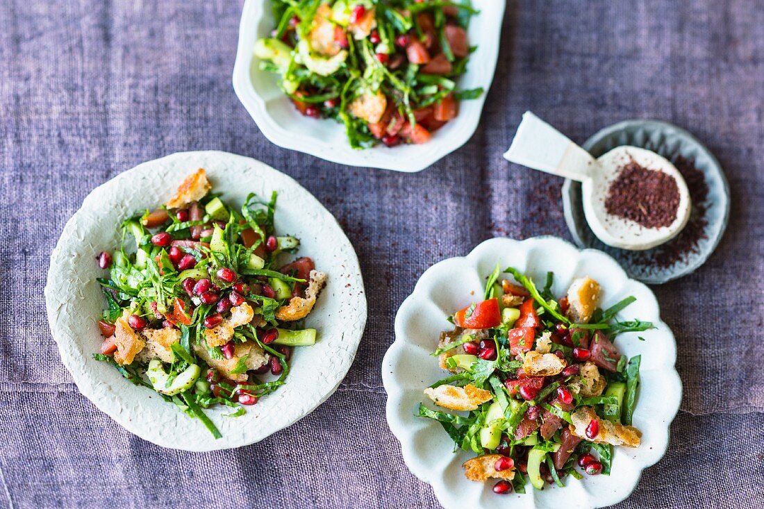 Fattoush with spinach and pomegranate seeds (Lebanon)